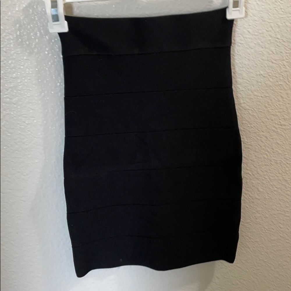 BEBE size Small. Black tight skirt